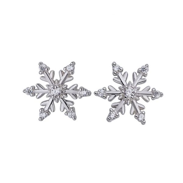 Silver ear studs with snowflake design and crystals